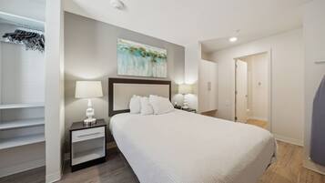 1 bedroom, desk, iron/ironing board, travel crib