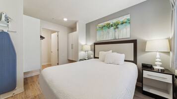 1 bedroom, desk, iron/ironing board, travel crib