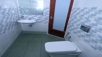 Shower, free toiletries, towels, soap