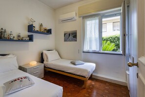 2 habitaciones, tabla de planchar con plancha y ropa de cama 