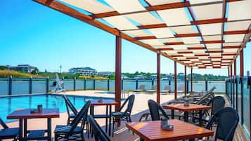 Outdoor pool, open 8:00 AM to 8:00 PM, free pool cabanas, pool umbrellas