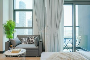 Appartamento Deluxe, vista città | Area soggiorno