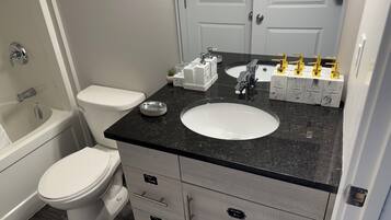 Hair dryer, towels, soap, shampoo