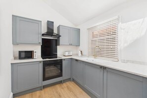 Fridge, microwave, oven, stovetop - Host & Stay | Captain's View (Whitby)
