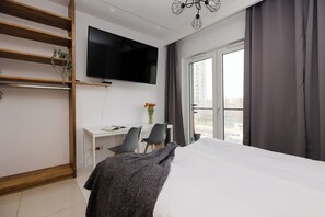 Blackout curtains, iron/ironing board