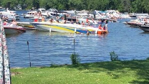 A marina filled with various boats. - Lakefront Cabin Hot Tub, Dock, and Adventure Shed (Sturgeon Bay)