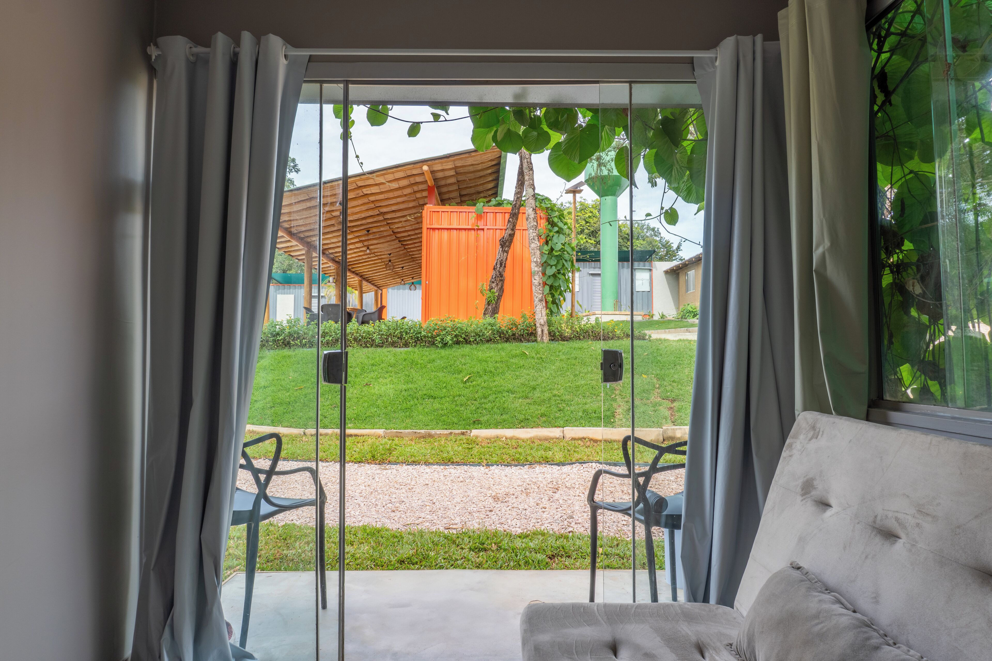 Comfort Triple Room, 1 Double Bed with Sofa bed, Balcony, Garden View | Living area | 43-inch Smart TV with digital channels