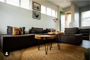 Luxury Duplex, Balcony, Courtyard View | Living area | 42-inch Smart TV with digital channels, Netflix, Hulu - Khaya apartments at Miombo Mews (Victoria Falls)