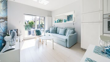 Apartamento (6) | Zona de estar | Una televisión de pantalla plana