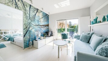 Apartamento (6) | Zona de estar | Una televisión de pantalla plana