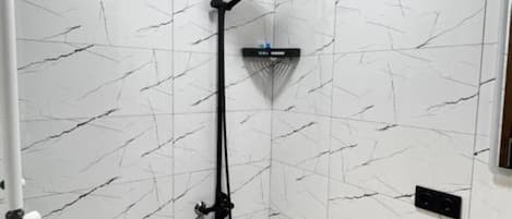 Shower, hair dryer, towels, soap