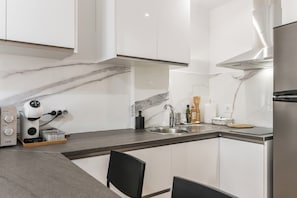Microwave, stovetop, coffee/tea maker, toaster