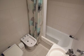 Hair dryer, bidet, towels, soap