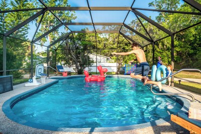 1 Min Private Beach & River Access w Movie Room, Heated Pool, Kayaks & Game Room