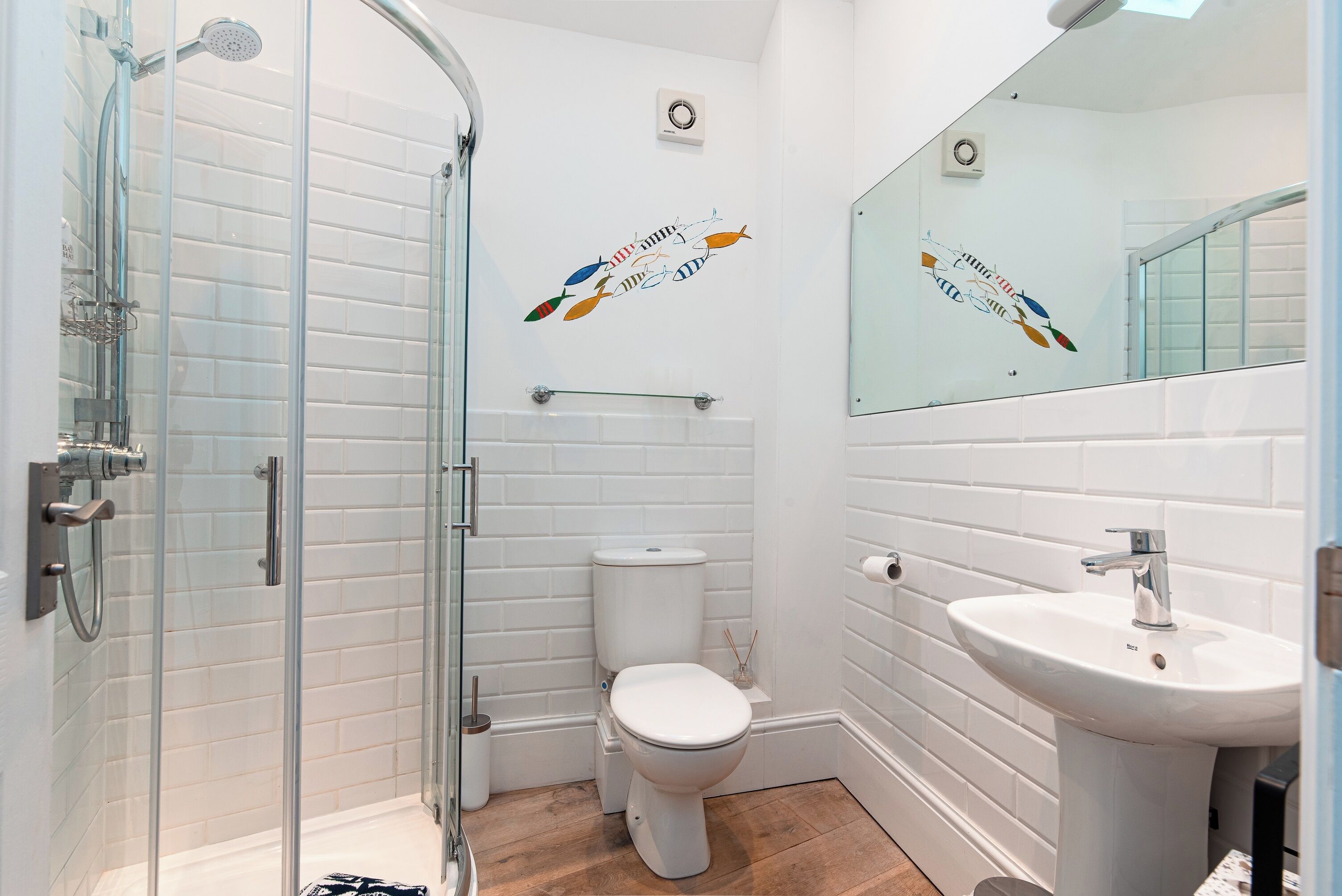 Shower, hair dryer, towels, toilet paper