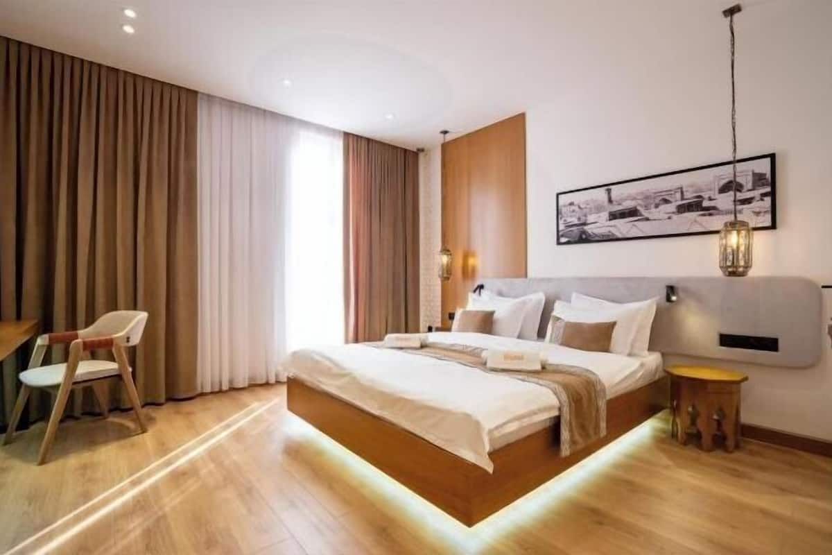 Blackout drapes, soundproofing, iron/ironing board (on request)