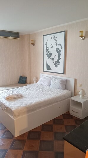 1 habitación, tabla de planchar con plancha, wifi y ropa de cama 