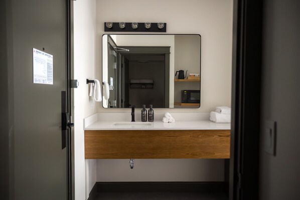 Double Queen Room (Self Check-in) | Bathroom | Free toiletries, hair dryer, towels, soap