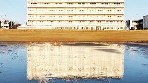 A multi-story building with a flat roof and a series of balconies. - Beachfront Condo with Amazing Ocean Views  4th Fl (Old Orchard Beach)
