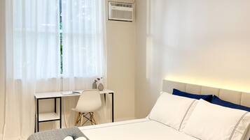 3 habitaciones, escritorio, tabla de planchar con plancha y wifi gratis