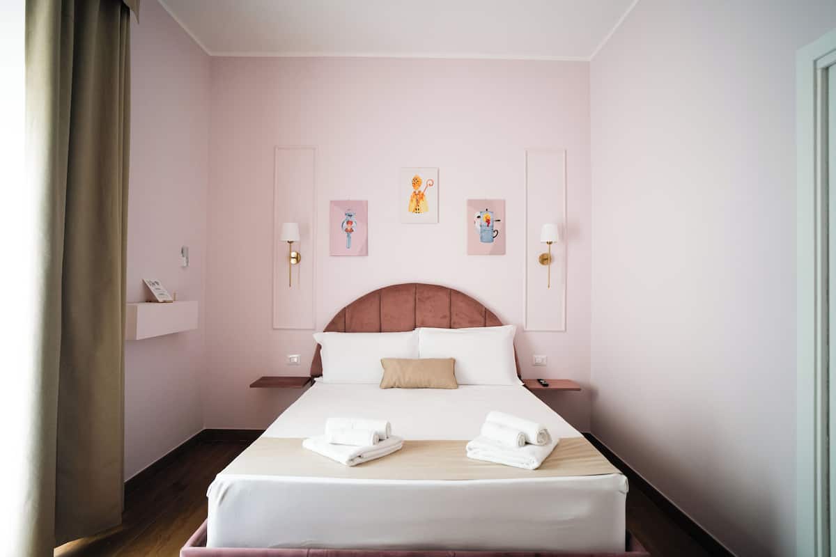 Premium bedding, down duvets, memory-foam beds, minibar