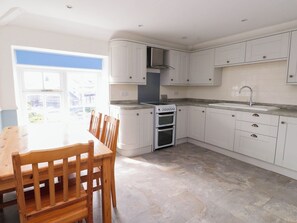 Fridge, microwave, cookware/dishes/utensils