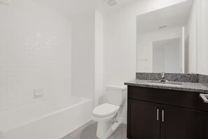 Hair dryer, towels, soap, toilet paper