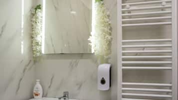 Hair dryer, towels, toilet paper