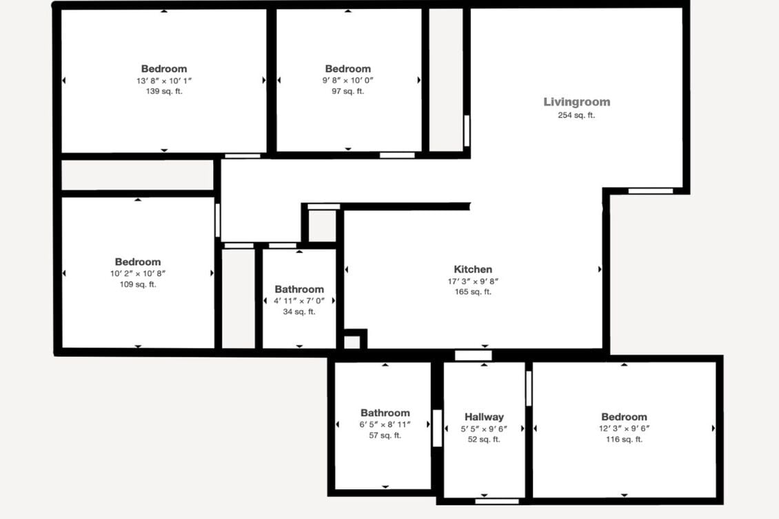 A floor plan with multiple bedrooms, a living room, a kitchen, two bathrooms, and a hallway.