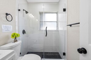 Shower, hair dryer, towels