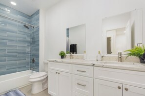 Hair dryer, towels, soap, toilet paper