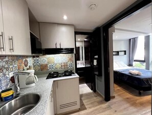 1 habitación, tabla de planchar con plancha, wifi gratis y ropa de cama 