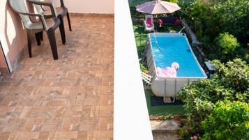 Seasonal outdoor pool, pool umbrellas, sun loungers