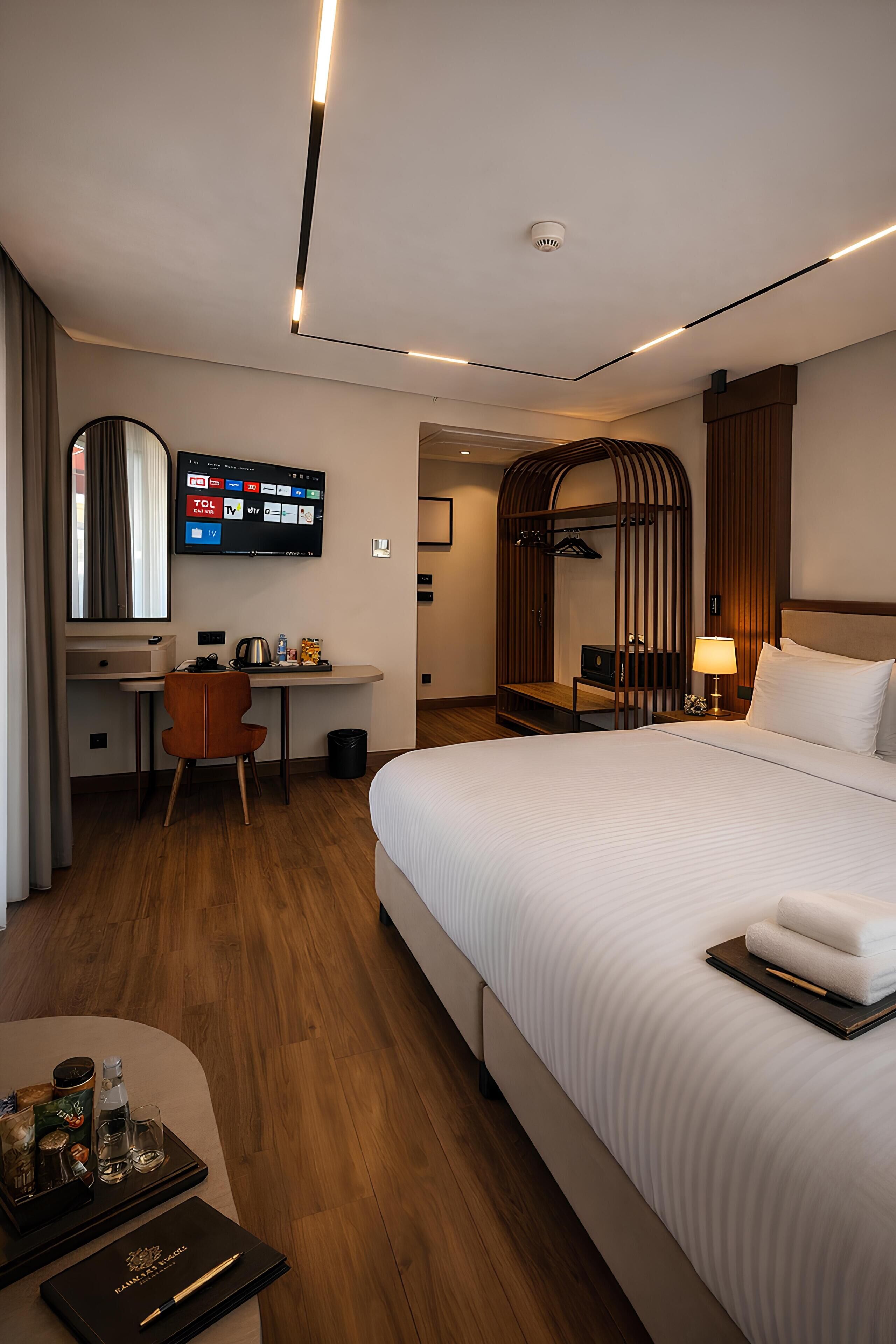 Kamar Double atau Twin Deluks, pemandangan kota | Minibar, setrika/meja setrika, Wi-Fi gratis, dan seprai linen