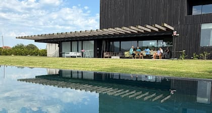 Spectacular architect's house with wonderful views of the meadows of Cantabria.
