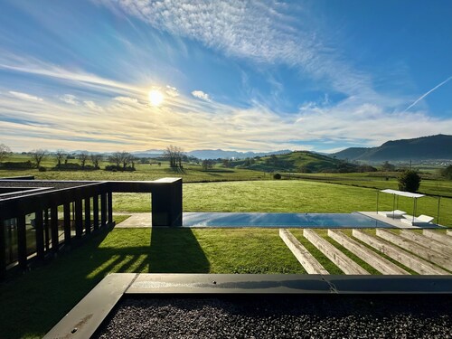 Spectacular architect's house with wonderful views of the meadows of Cantabria.