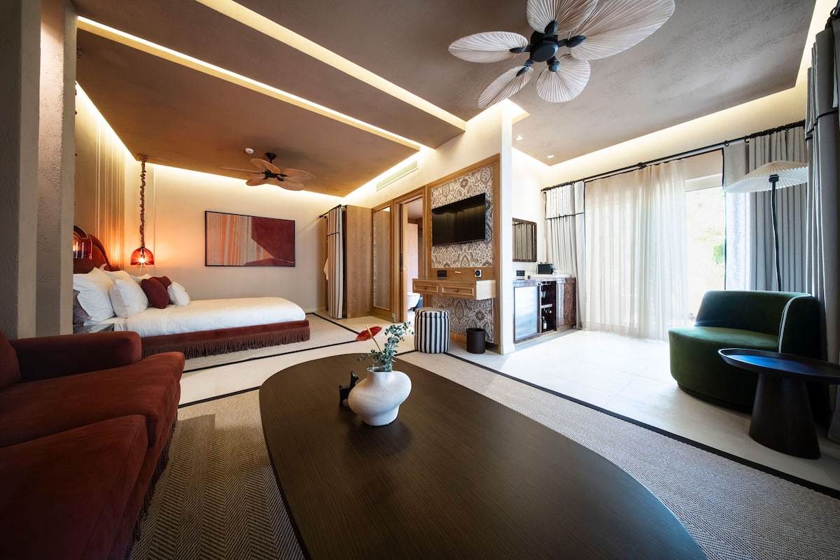 Suite, tuin | 1 slaapkamer, pillowtop-bedden, een minibar, een bureau