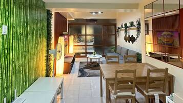 Family Apartment, 1 Queen Bed with Sofa bed, Balcony, City View | In-room dining