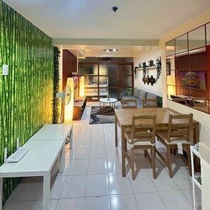 Family Apartment, 1 Queen Bed with Sofa bed, Balcony, City View | In-room dining - Home Sweet Home at Makati (Makati)