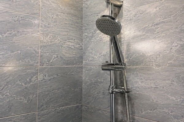 Separate tub and shower, free toiletries, towels, soap