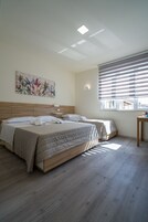 Family Triple Room, Ensuite, City View | Premium bedding, memory foam beds, minibar, laptop workspace