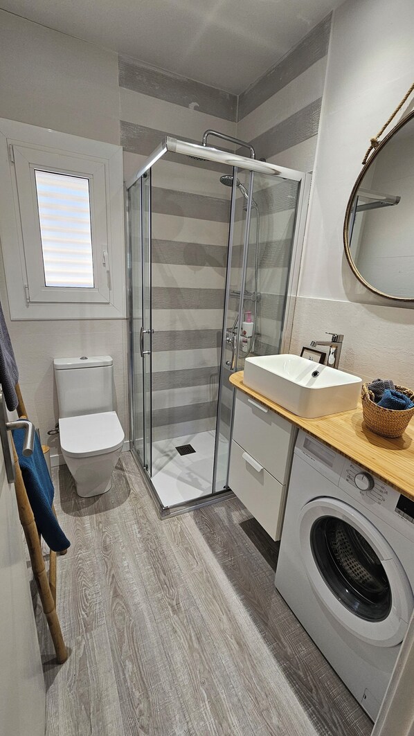 Hair dryer, towels, soap, toilet paper