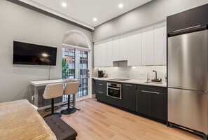 Apartamento estándar, 1 cama de matrimonio | 1 dormitorio, tabla de planchar con plancha, wifi gratis