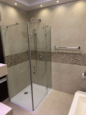 Shower, hair dryer, towels, soap