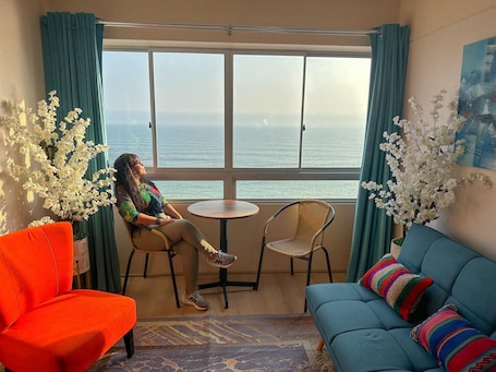 Comfort Apartment, 3 Bedrooms, Balcony, Beach View | Living area | Flat-screen TV