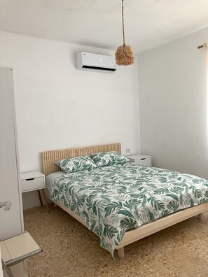 2 dormitorios, tabla de planchar con plancha, wifi gratis y ropa de cama