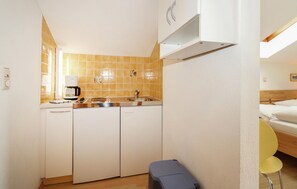 Fridge, stovetop, coffee/tea maker, cookware/dishes/utensils