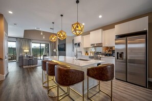 Fridge, microwave, oven, stovetop - Luxury 4-Bedroom Home with Ensuite Baths: Steps from Disney! (Kissimmee)