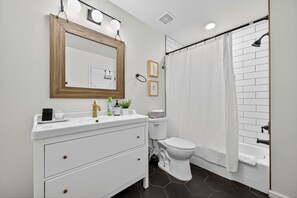 Hair dryer, towels, soap, toilet paper