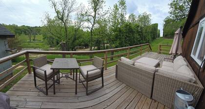 Waterfront cabin w/creek waterfall, pond & 2 decks. Secluded in the Ozark hills.